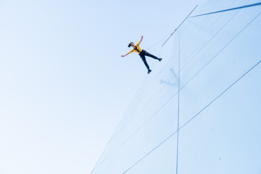 a person walking on a wall